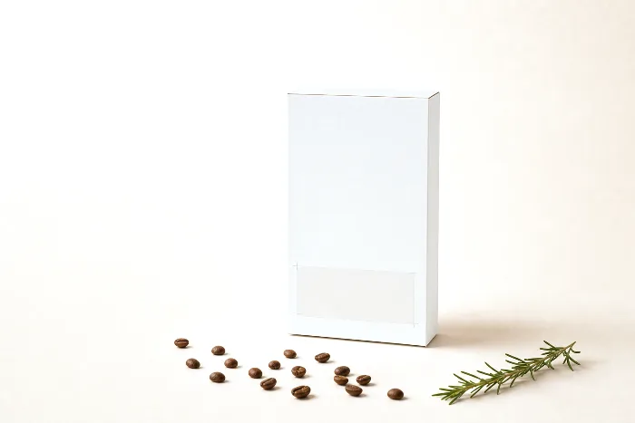 Blank white carton with a taped-off rectangle on its back panel and pencil ticks marking the corners.